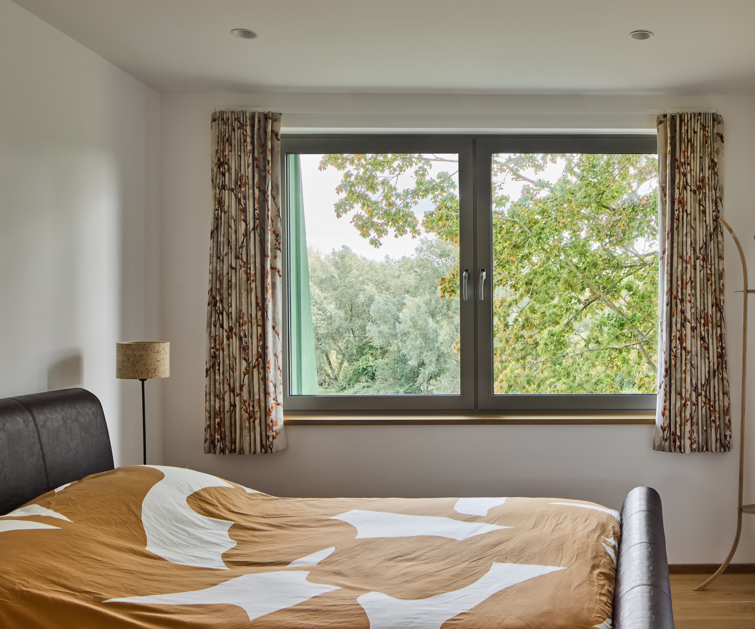 Bedroom with large window