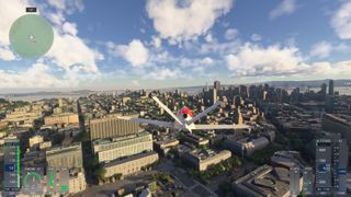 An small jet plane flying over a city