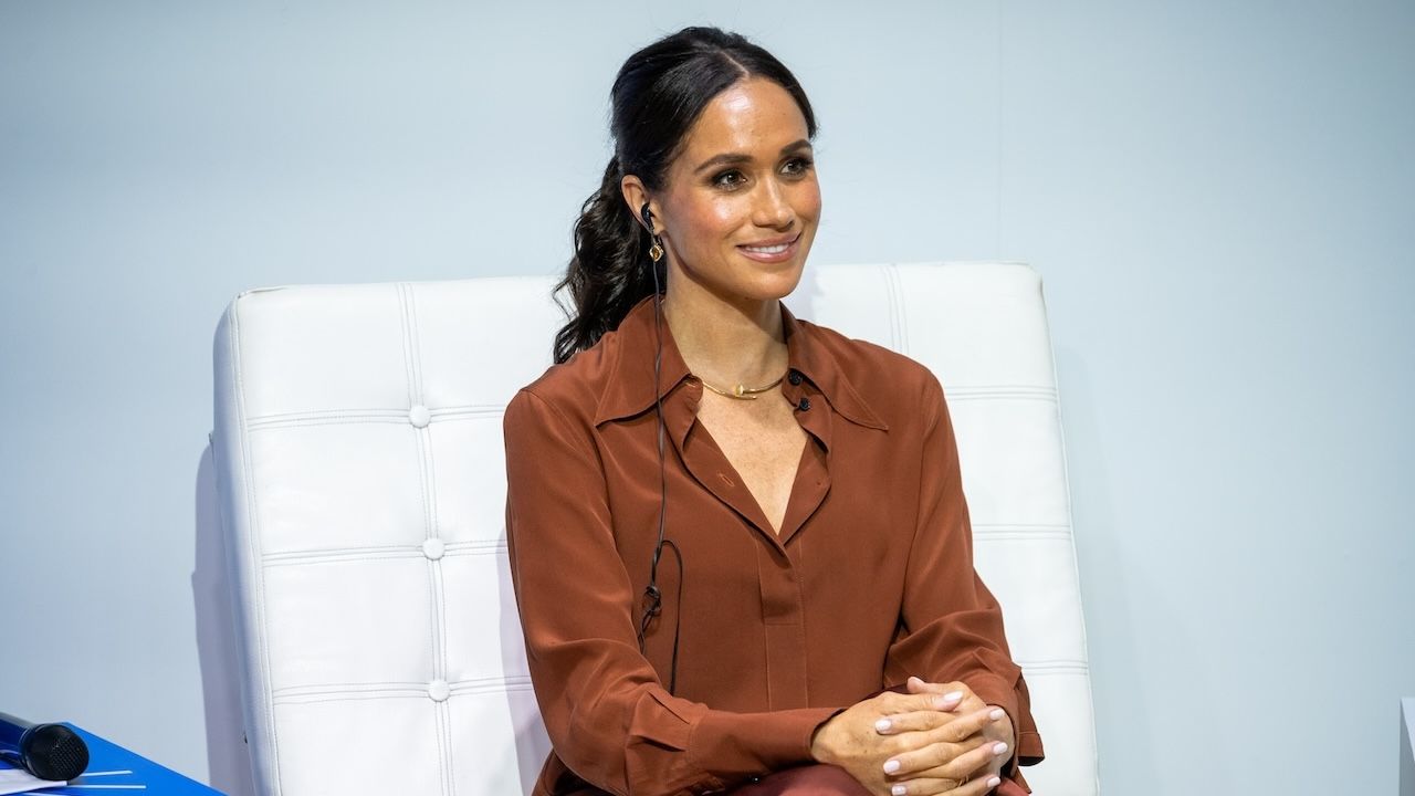 Meghan Markle wearing a brown co-ord and a gold Cartier necklace in Colombia August 2024