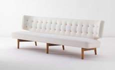 White sofa with wooden frame