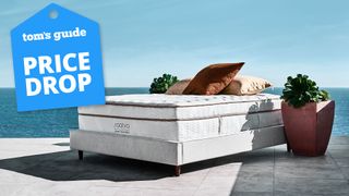 The Saatva Classic Mattress on a bed frame outdoors, a Tom's Guide price drop deals graphic (right)