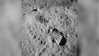 Close-up view of astronaut's footprint in lunar soil.