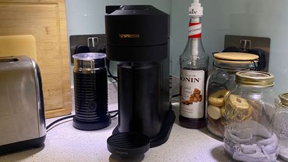 Nespresso coffee maker Vertuo next in Louises kitchen with milk frother