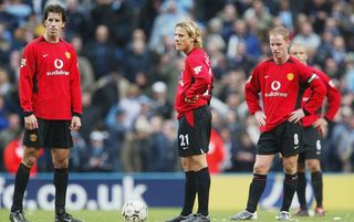Manchester United's Ruud van Nistelrooy, Diego Forlan and Nicky Butt look on during their 2004 defeat to Manchester City