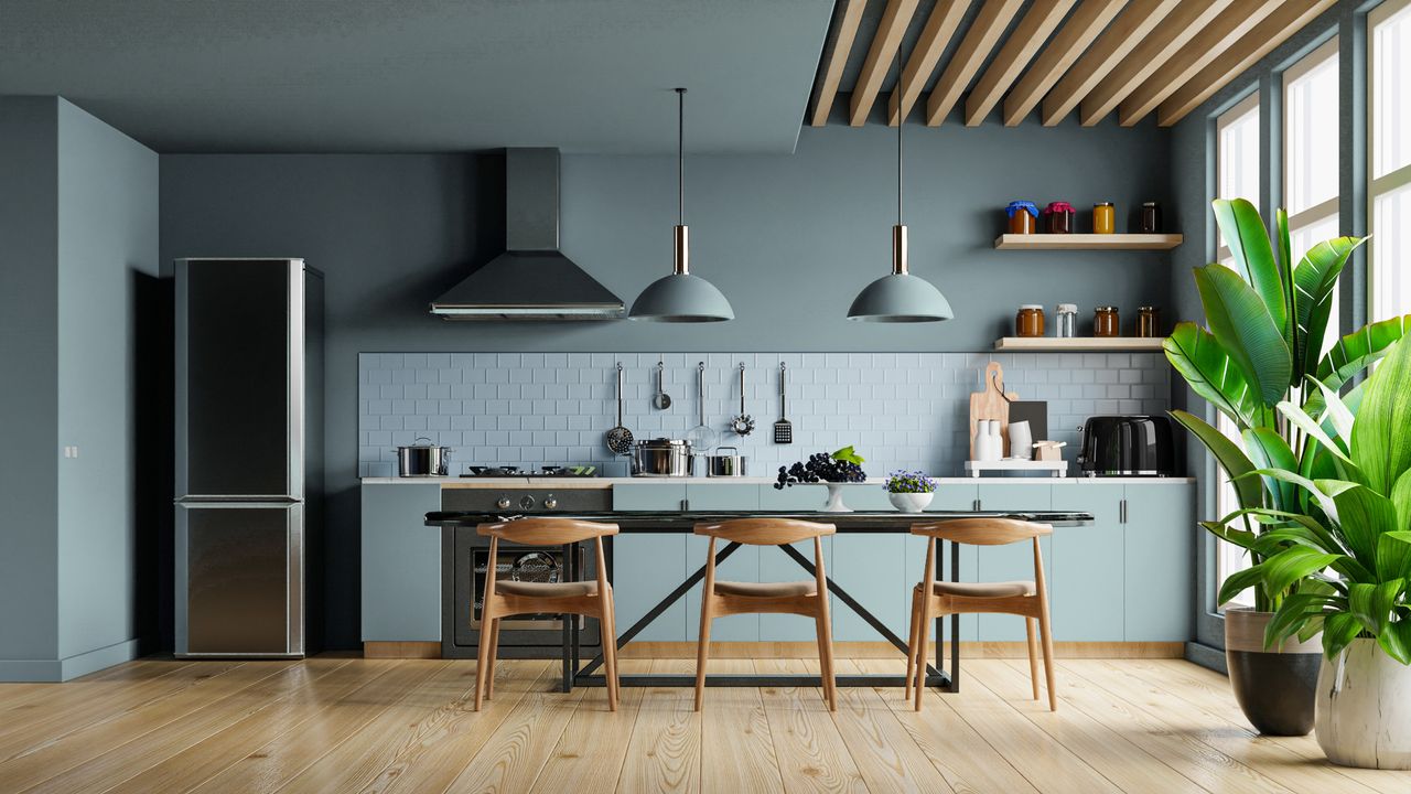 Blue painted kitchen with wooden accents