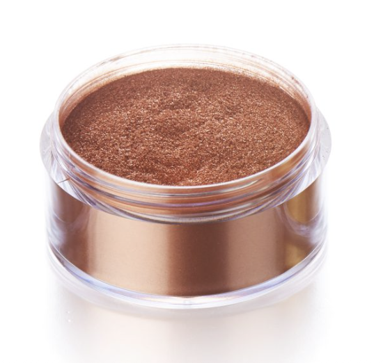 a plastic tub of copper glitter