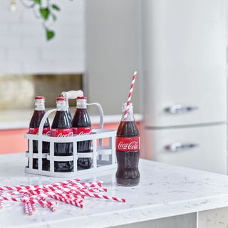 cola with marble table