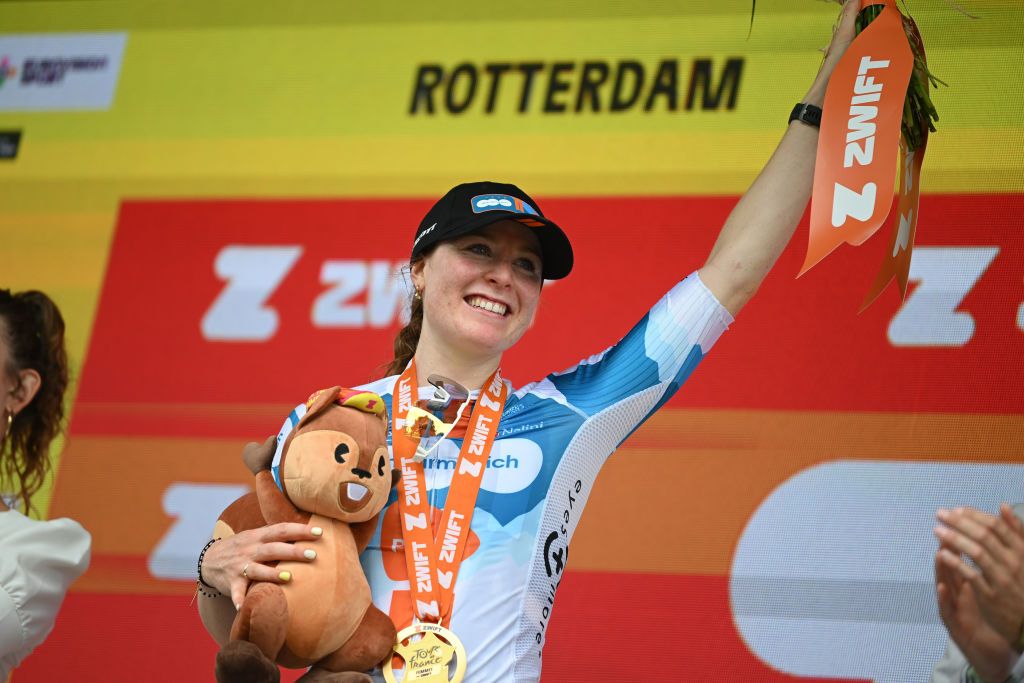 DORDRECHT NETHERLANDS AUGUST 13 Charlotte Kool of The Netherlands and Team dsmfirmenich PostNL celebrates at podium as stage winner during the 3rd Tour de France Femmes 2024 Stage 2 a 679km stage from Dordrecht to Rotterdam UCIWWT on August 13 2024 in Dordrecht Netherlands Photo by Dario BelingheriGetty Images