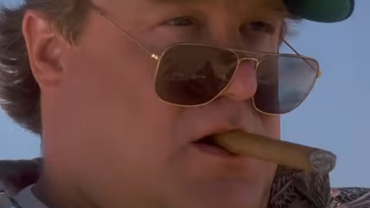 John Goodman with a cigar in his mouth in Always