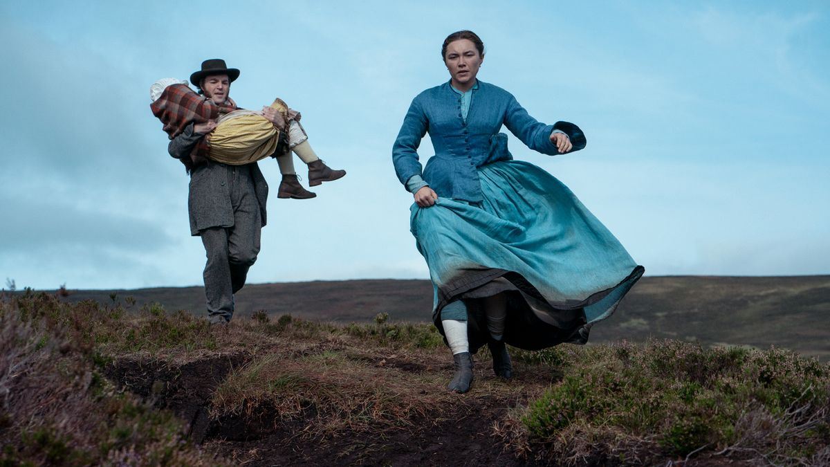 Will Byrne (Tom Burke) carrying Anna walking alongside Lib Wright