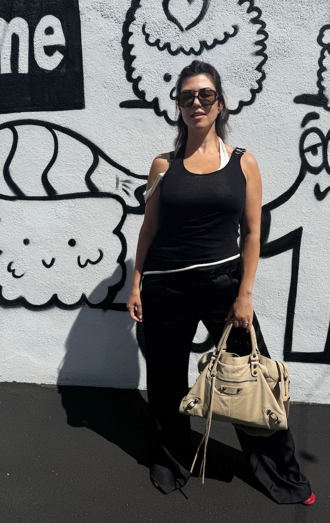 Kourtney Kardashian wears the Balenciaga Le City Bag