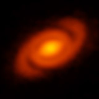 Orange spiral shape around glowing yellow center