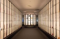 walls of beauty products on display inside Shiseido Corportate Museum