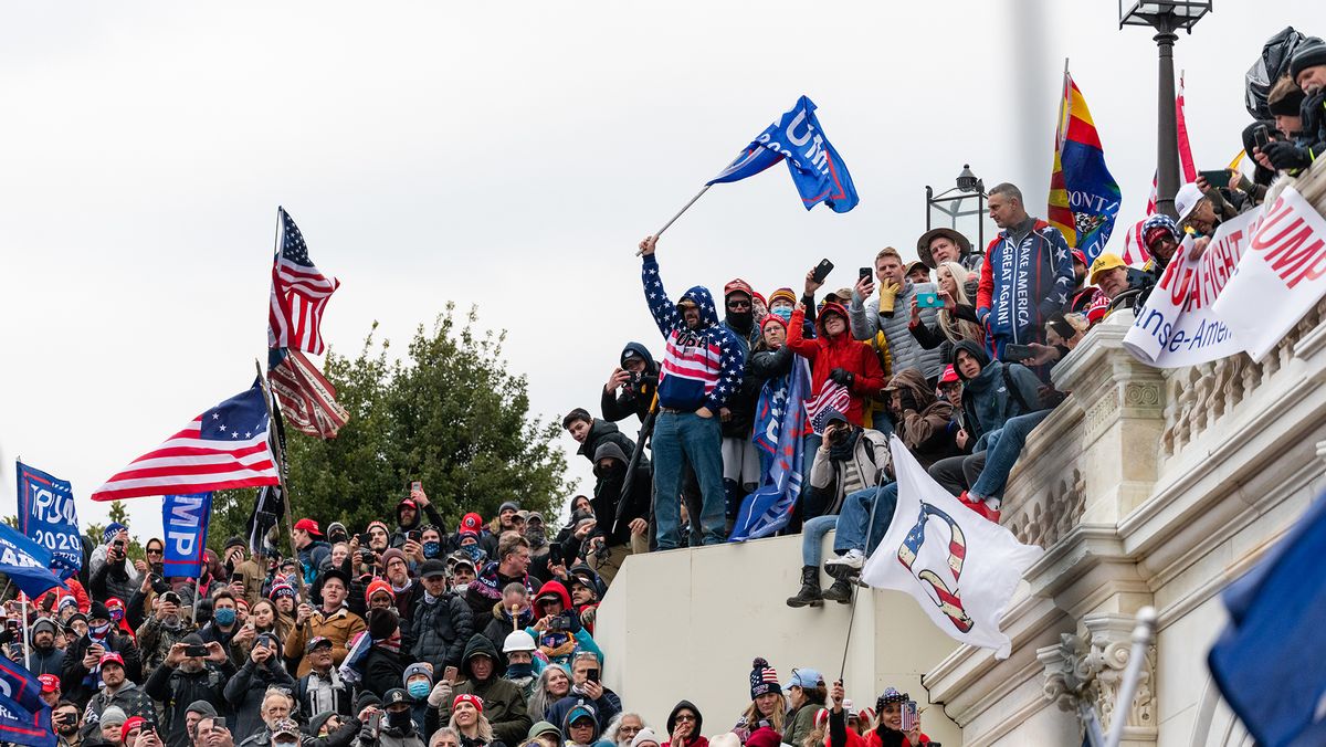 Demonstrators swarm the U.S. Capitol building during a protest in Washington, D.C., U.S., on Wednesday, Jan. 6, 2021.