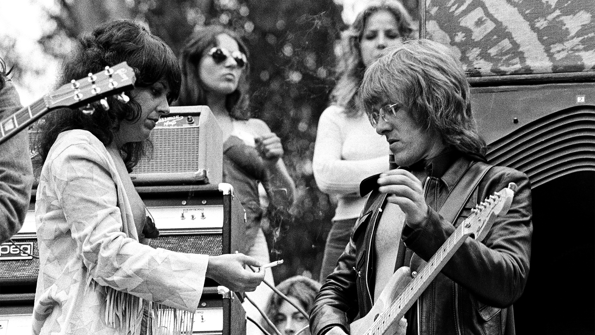 Grace Slick and Paul Kantner of Jefferson Airplane onstage at Golden Gate Park in 1975 in San Francisco, California.