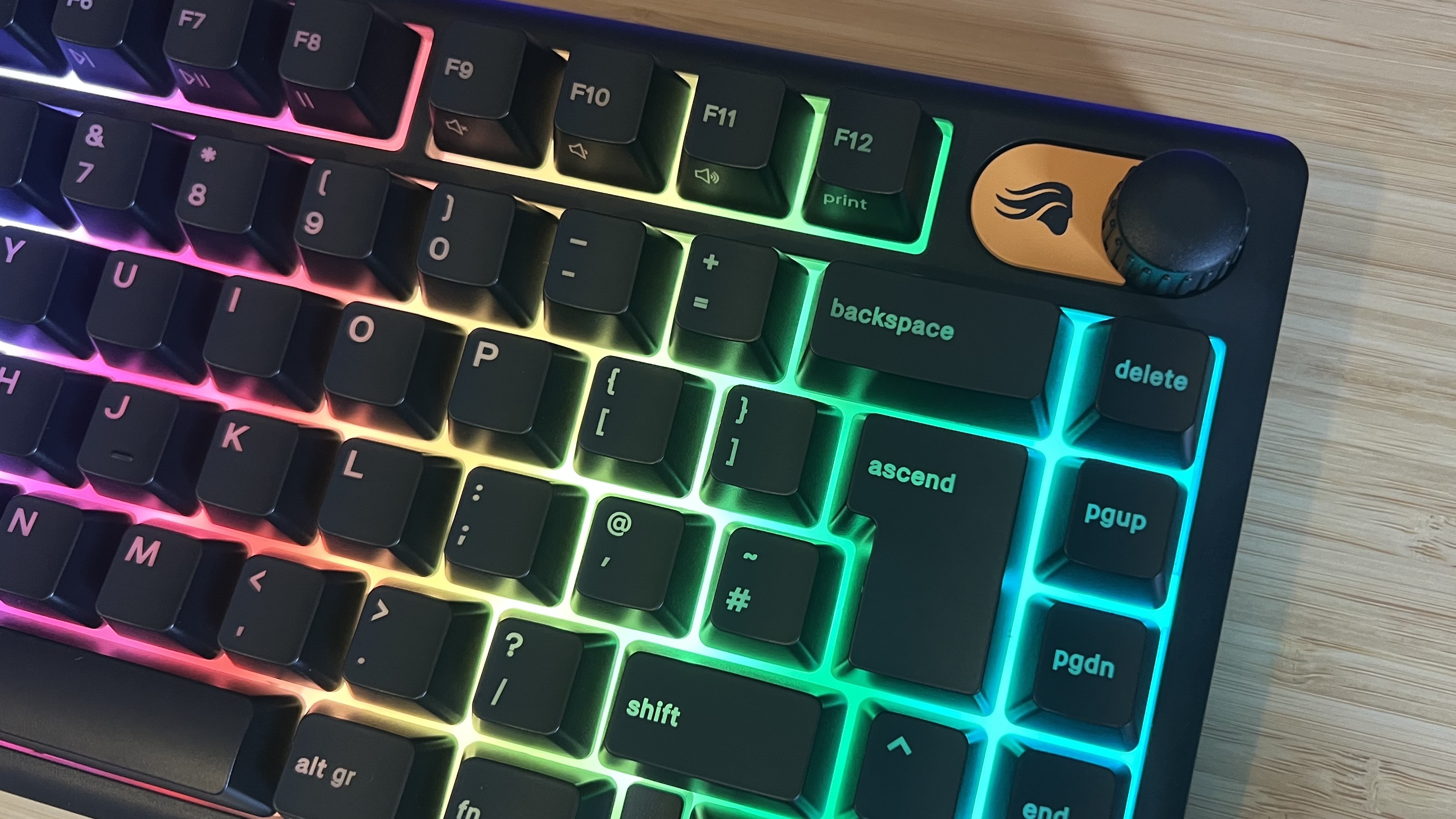 Glorious GMBK gaming keyboard close up on volume dial, function row, and navigational keys