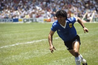 Diego Maradona celebrates after scoring for Argentina against England in the quarter-finals of the 1986 World Cup.