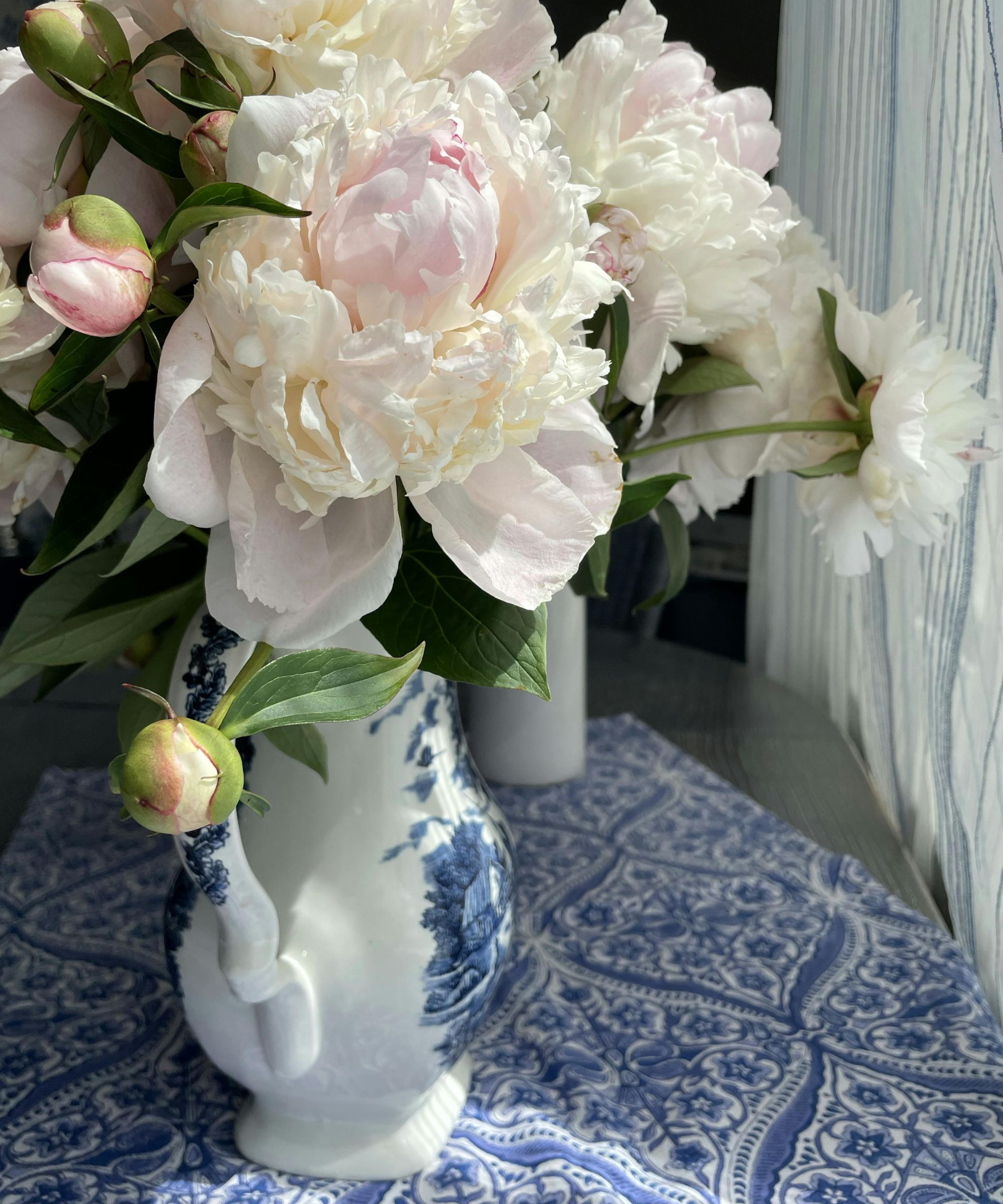 vintage blue and white tea pot with peonies in