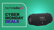 JBL Xtreme 4 on emerald background with the words 'TechRadar: Cyber Monday Deals' on the left side of the image