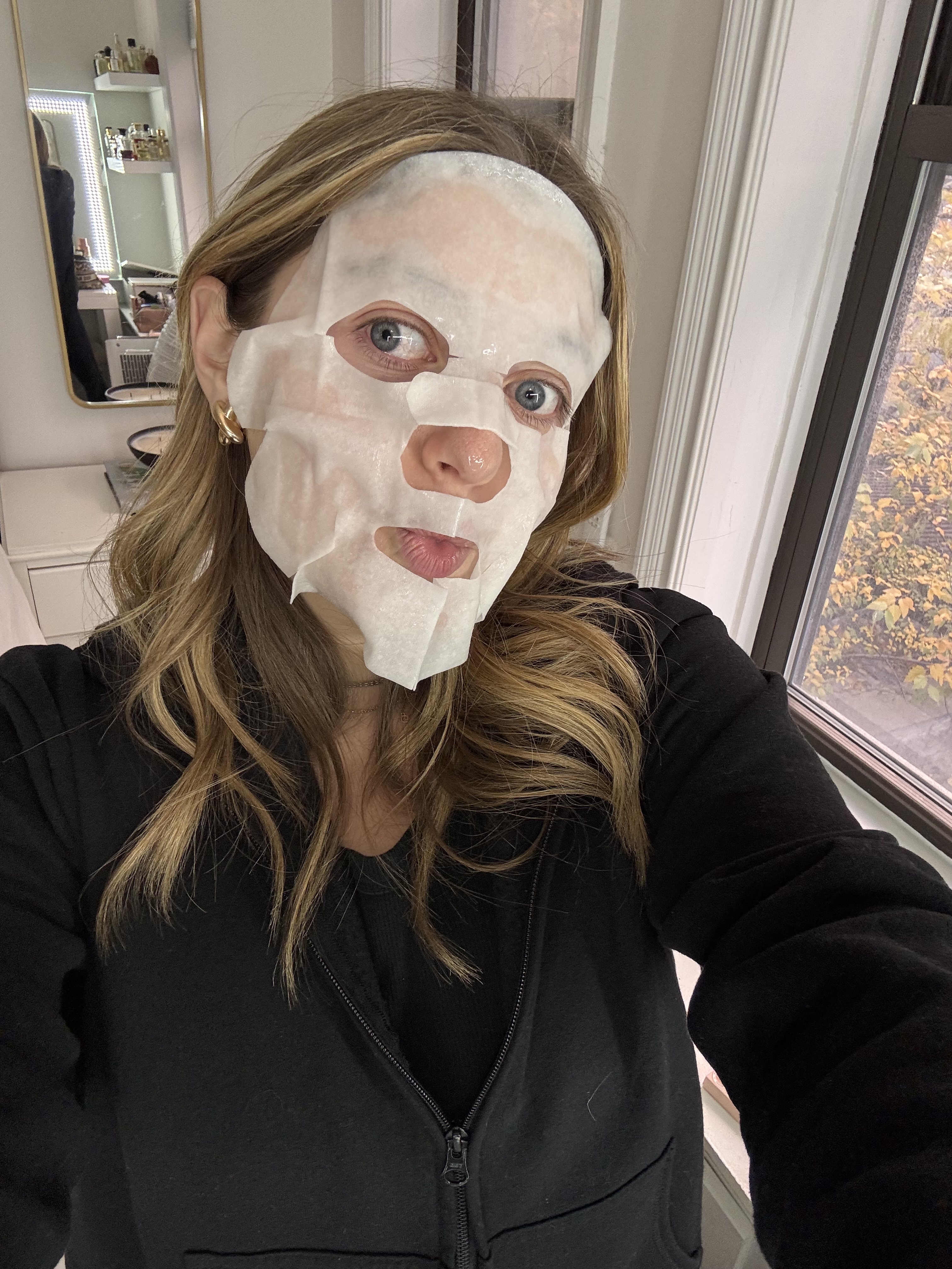 girl with blonde hair before and after applying face mask