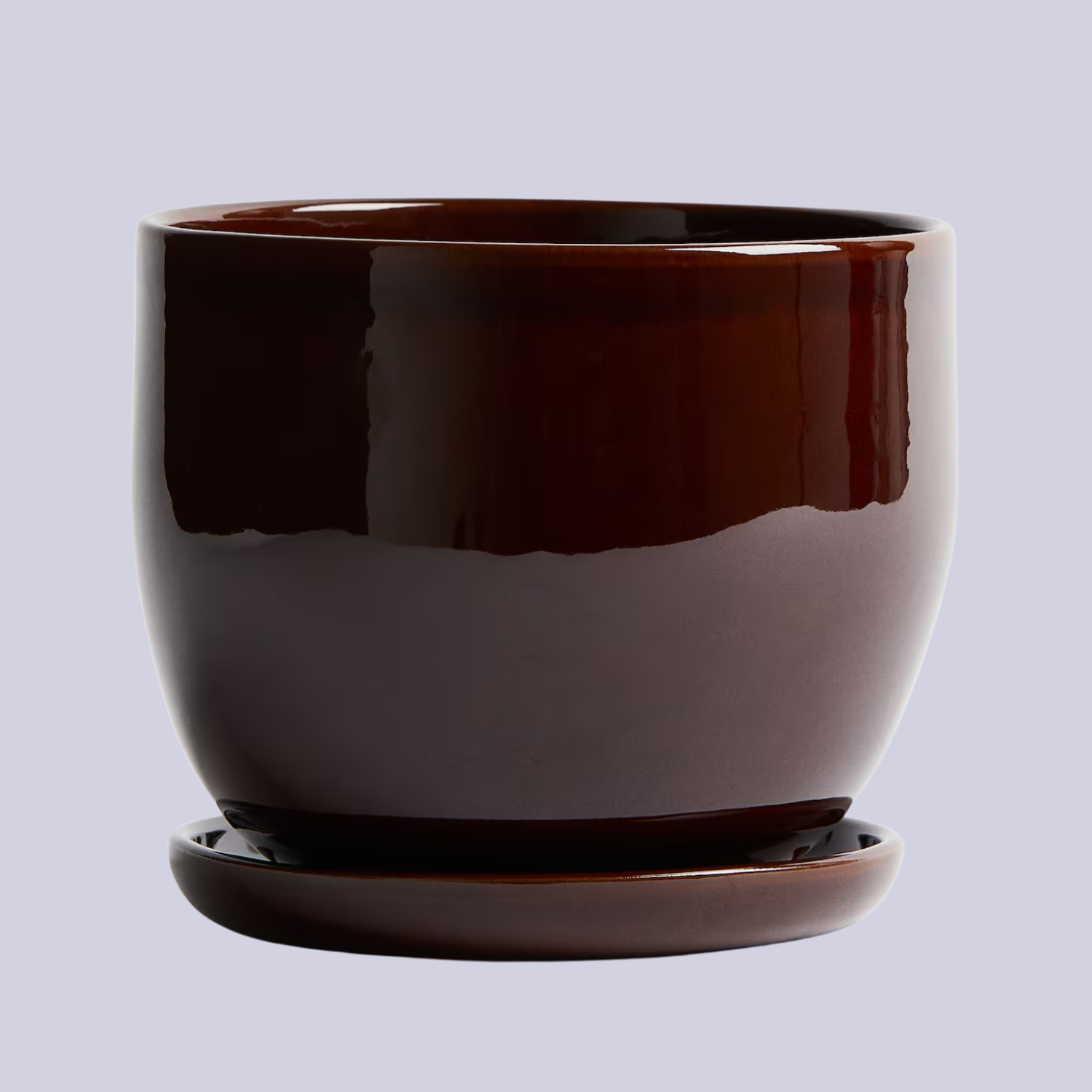 A dark brown terracotta pot and saucer