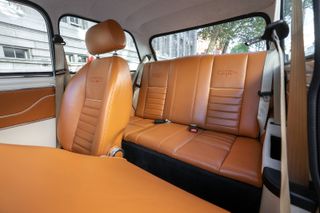 Mini eMastered by David Brown Automotive tan leather interior showing rear seats