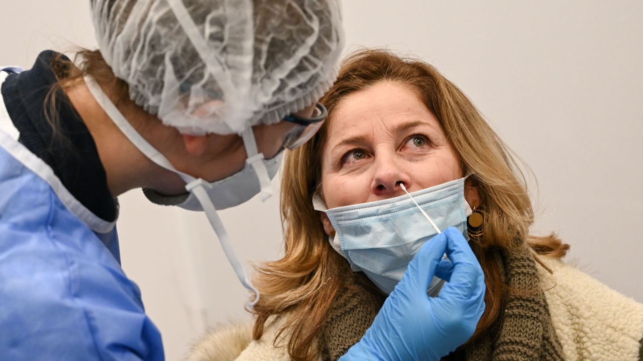 Woman has a PCR test