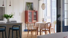 a bistro table in a modern open plan kitchen
