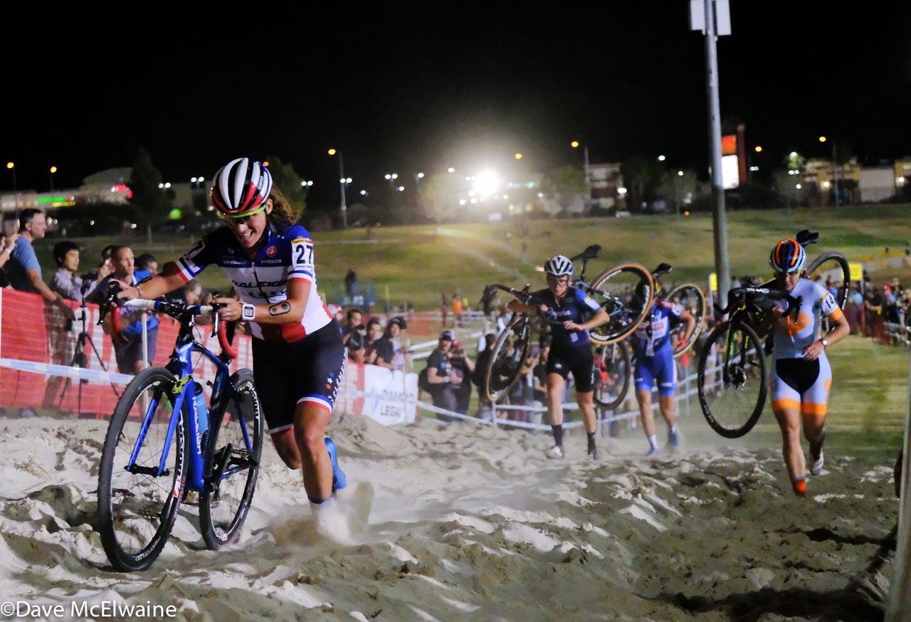 Caroline Mani runs through the sand at CrossVegas