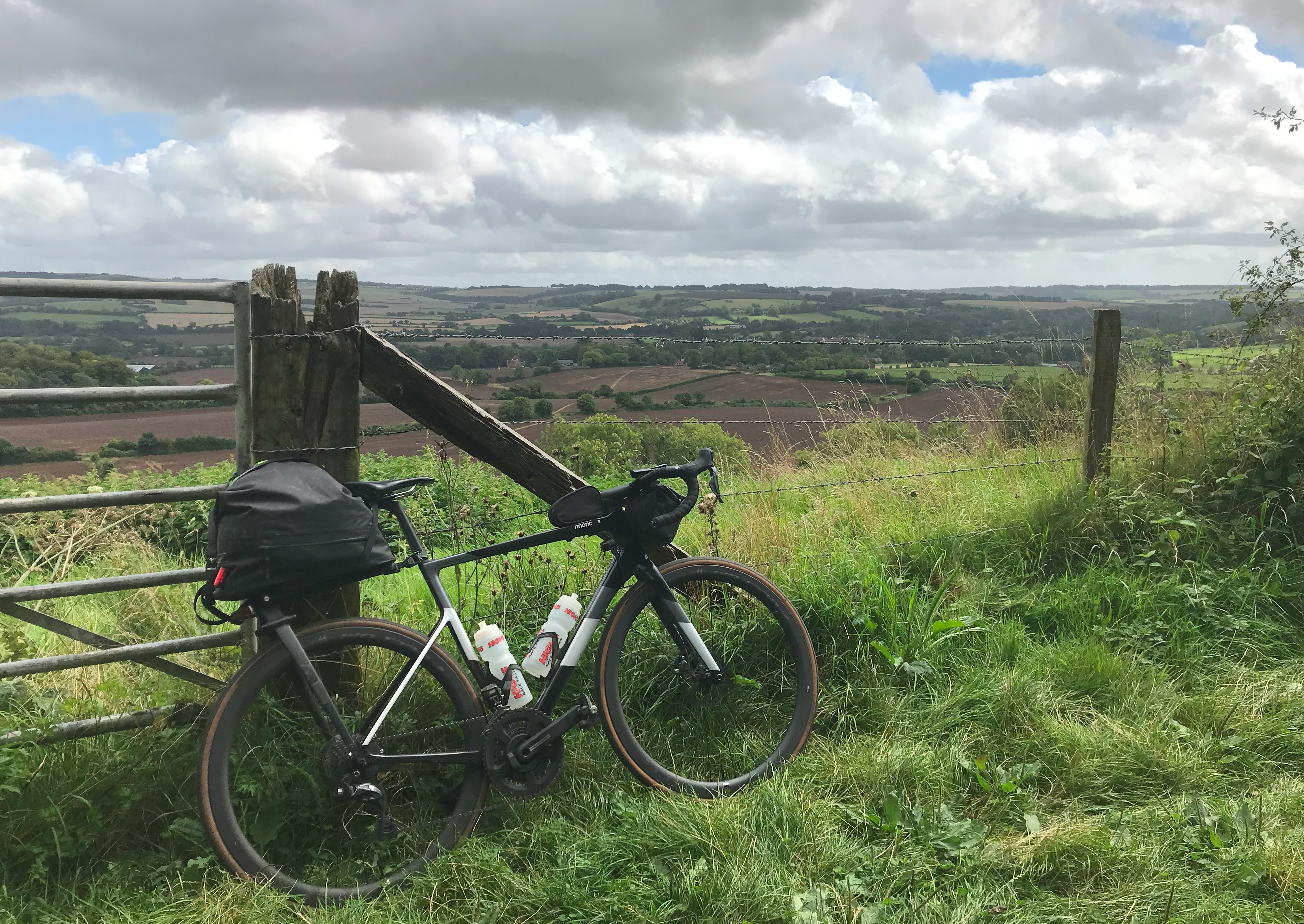 Cannondale SuperSix with Fulcrum wheels against field gate