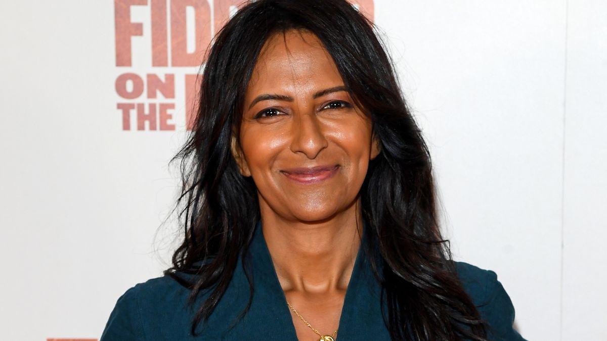 Ranvir Singh's teal corduroy jumpsuit is a beautiful denim alternative that takes mere moments to style