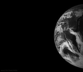 This image of Earth is one of the first snapshots sent back home by NASA’s Juno spacecraft during its flyby on October 9, 2013.