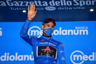 CAMIGLIATELLO SILANO ITALY OCTOBER 07 Podium Filippo Ganna of Italy and Team INEOS Grenadiers Blue Mountain Jersey Celebration during the 103rd Giro dItalia 2020 Stage 5 a 225km stage from Mileto to Camigliatello Silano 1275m girodiitalia Giro on October 07 2020 in Camigliatello Silano Italy Photo by Stuart FranklinGetty Images