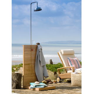 beach side outdoor shower with hot water faucet