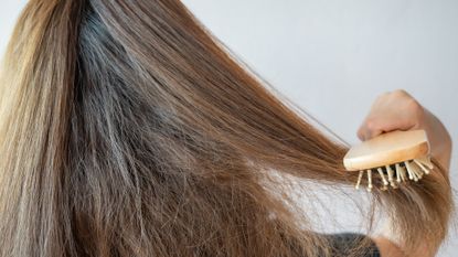 tame frizzy hair dental floss