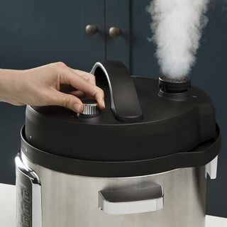 Releasing steam from the Crockpot Turbo Express Electric Pressure Cooker