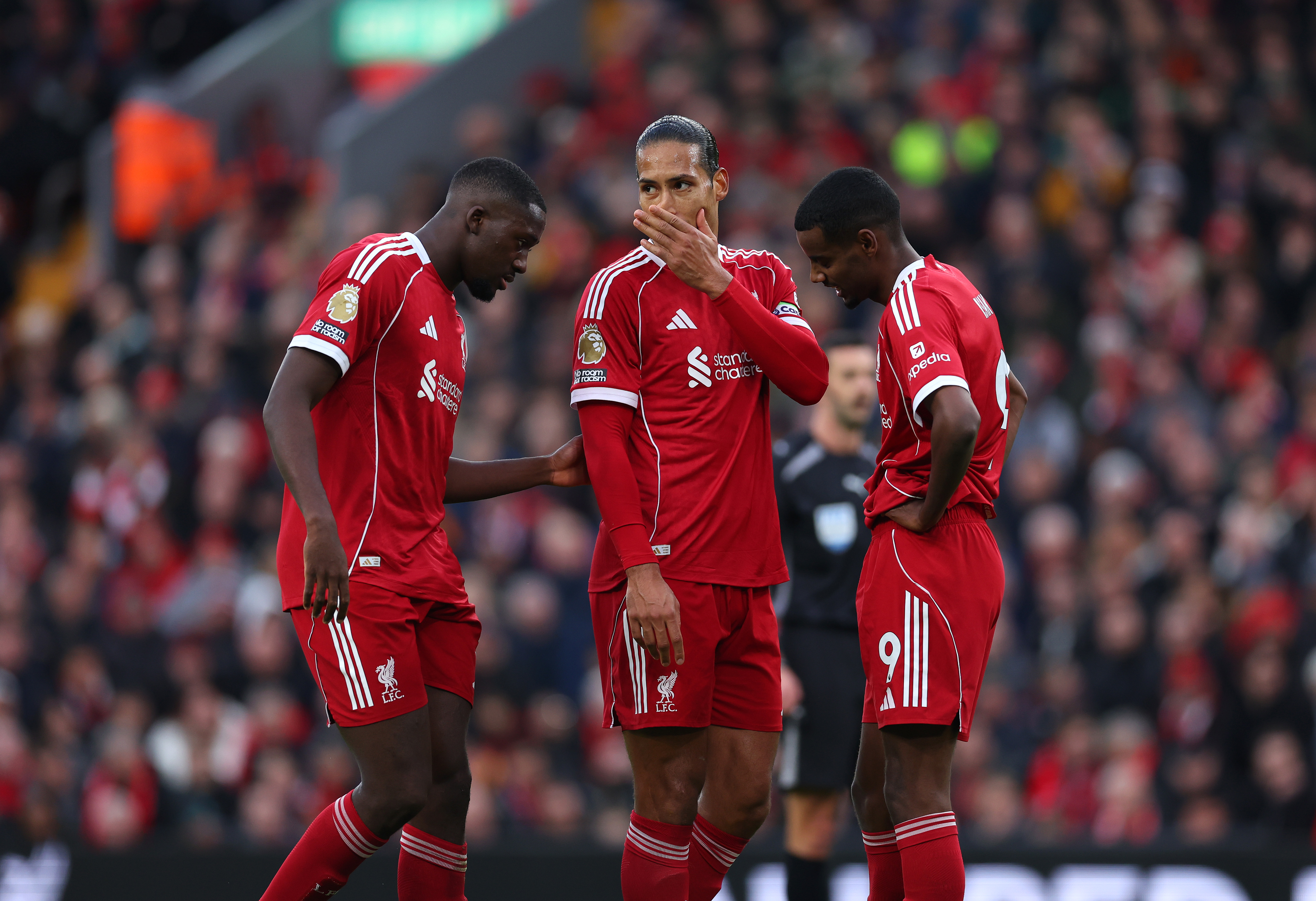 LIVERPOOL, ENGLAND - NOVEMBER 22: Ibrahima Konate, Virgil van Dijk and Alexander Isak of Liverpool interact during the Premier League match between Liverpool and Nottingham Forest at Anfield on November 22, 2025 in Liverpool, England. (Photo by Molly Darlington/Getty Images)