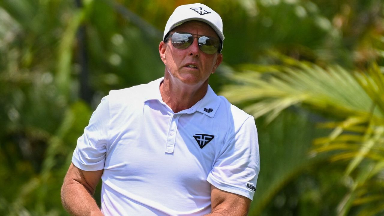 Phil Mickelson takes a shot during the 2023 LIV Golf Singapore event