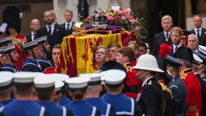 The coffin of Queen Elizabeth II is placed on a gun carriage ahead of the State Funeral of Queen Elizabeth II at Westminster Abbey 