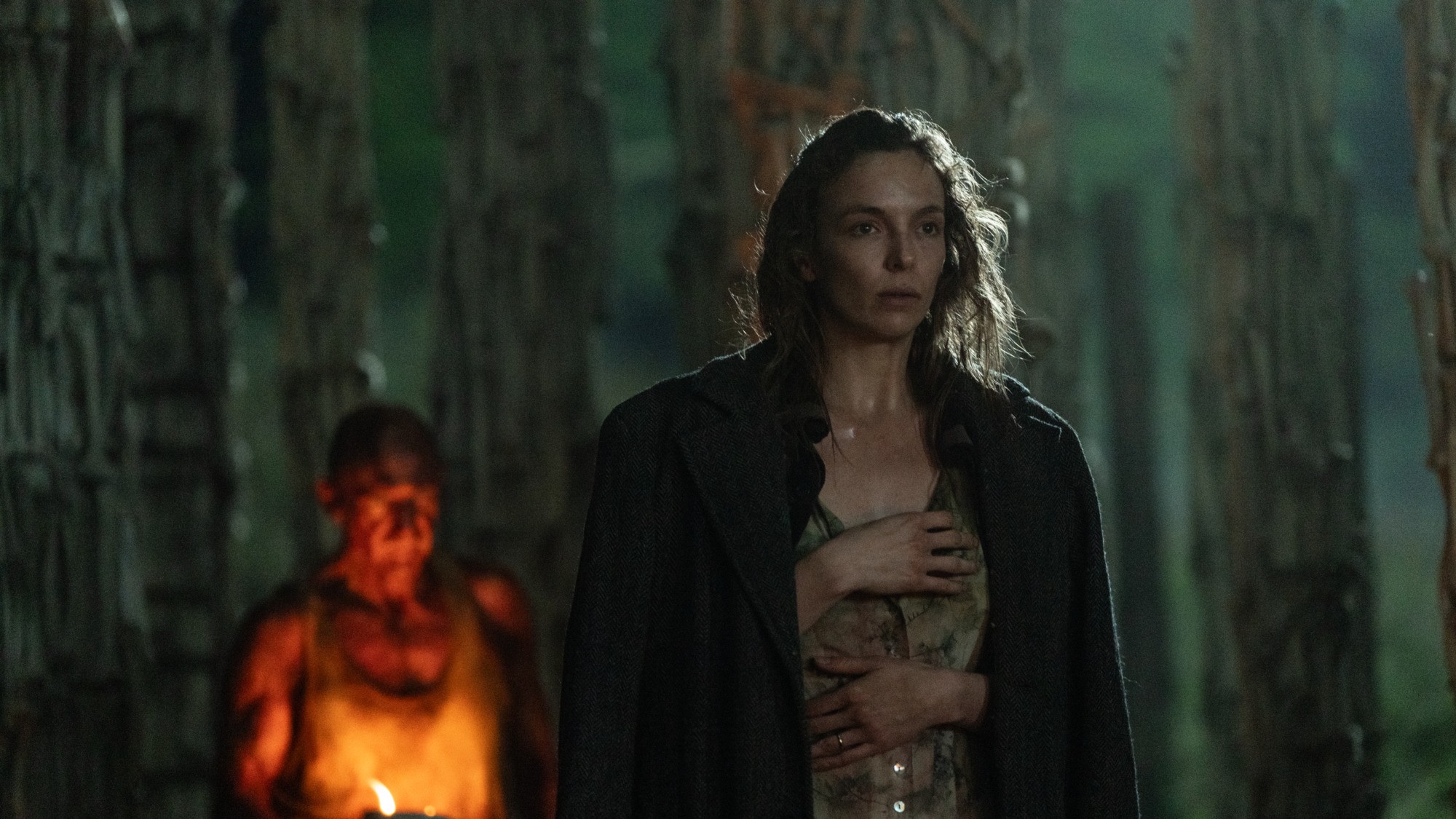 Ralph Fiennes trailing behind Jodie Comer in 28 Years Later