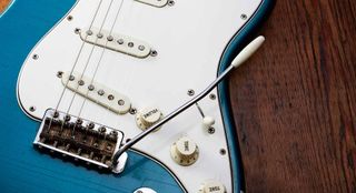 For vibrato setups, get your guitar in tune first before making any adjustments to the screws.