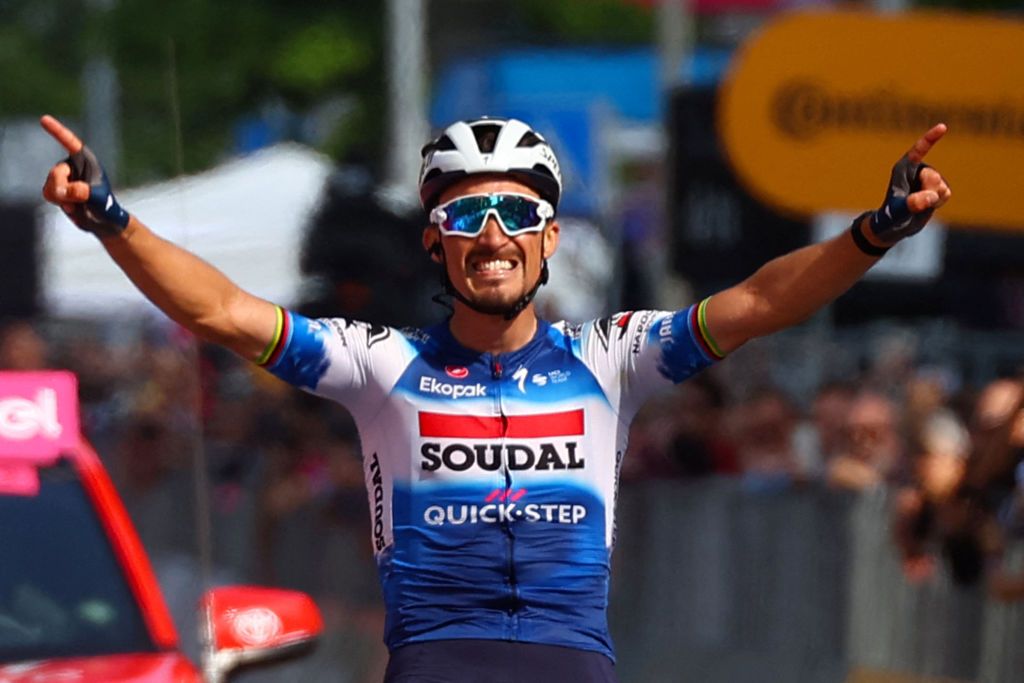 Team Soudal-Quick Step's French rider Julian Alaphilippe celebrates as he crosses the finish line to win the 12th stage of the 107th Giro d'Italia cycling race, 193km between Martinsicuro and Fano, on May 16, 2024. (Photo by Luca Bettini / AFP)