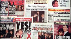 Newspaper front pages covering Tony Blair's 1997 landslide victory