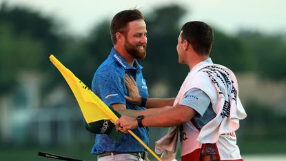Chris Kirk is congratulated by his caddie after winning the 2023 Honda Classic