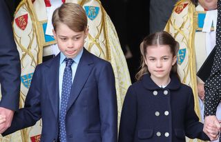 Prince George of Cambridge and Princess Charlotte of Cambridge depart the memorial service for the Duke Of Edinburgh