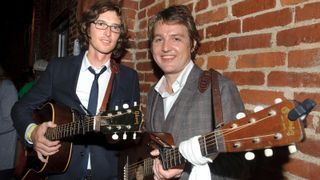 Joey Ryan and Kenneth Pattengale of The Milk Carton Kids gather backstage during the Bluegrass Situation's showcase at the Americana Music Festival on September 18, 2013 in Nashville, Tennessee.