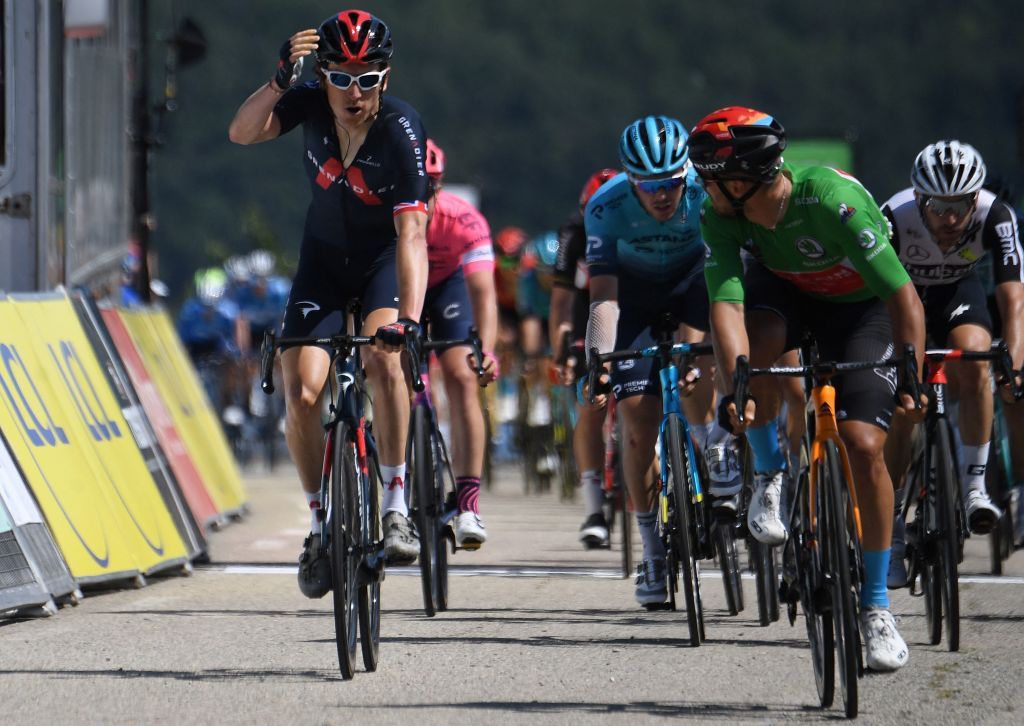 Team Ineos Geraint Thomas of Great Britain L celebrates as he crosses the finish line ahead of Team Bahrains Sonny Colbrelli of Italy wearing the best sprinters green jersey at the end of the during the fifth stage of the 73rd edition of the Criterium du Dauphine cycling race a 175km between SaintChamond and SaintVallier on June 3 2021 Photo by Alain JOCARD AFP Photo by ALAIN JOCARDAFP via Getty Images