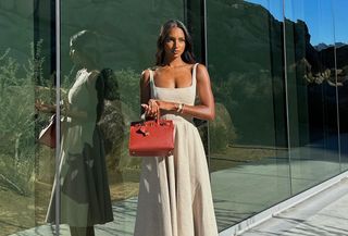 Jasmine Tookes wearing an A-line dress.