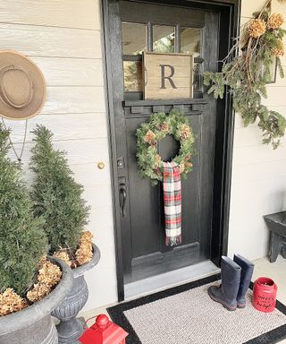 A personalized letter front door decor idea for Christmas