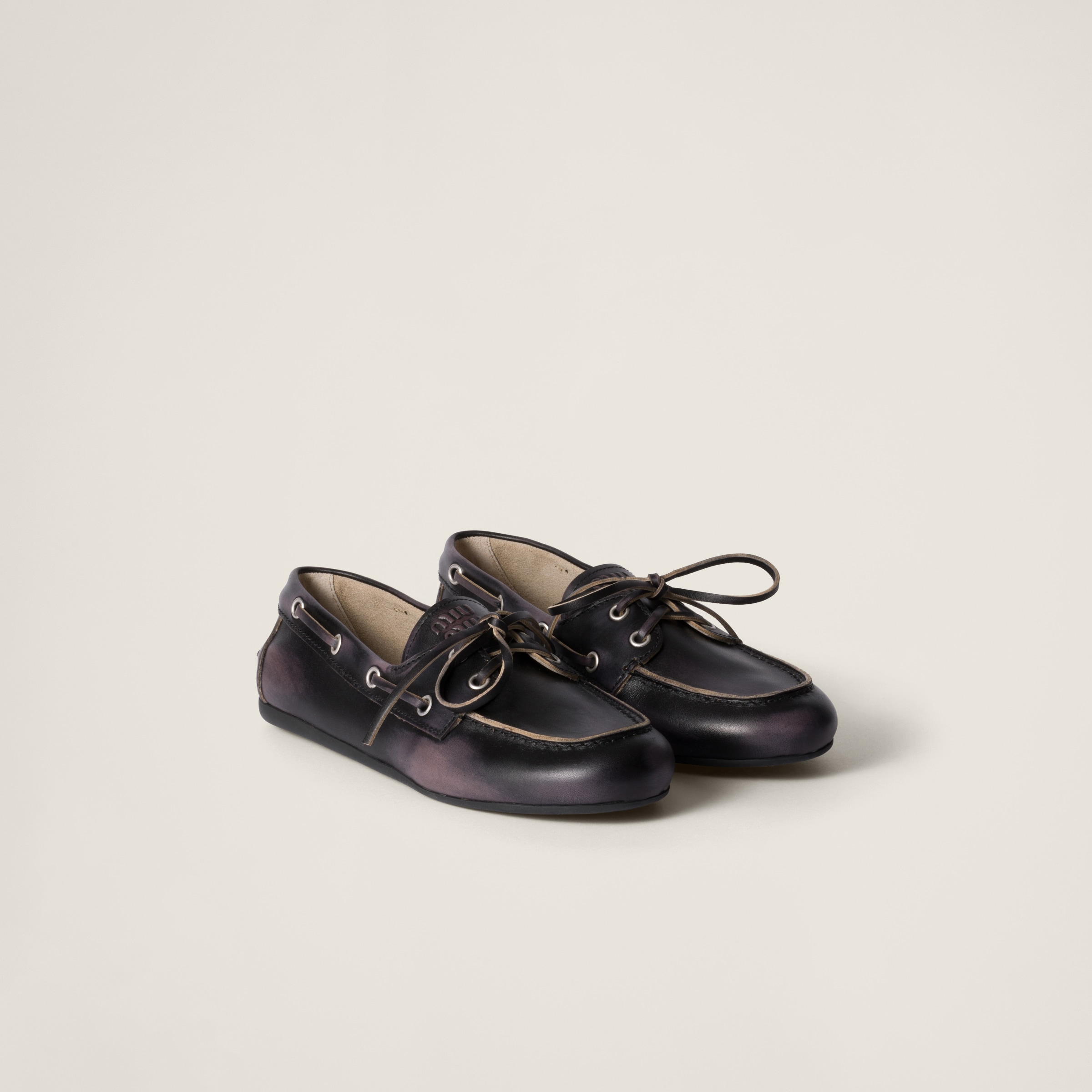 bleached leather deck shoes